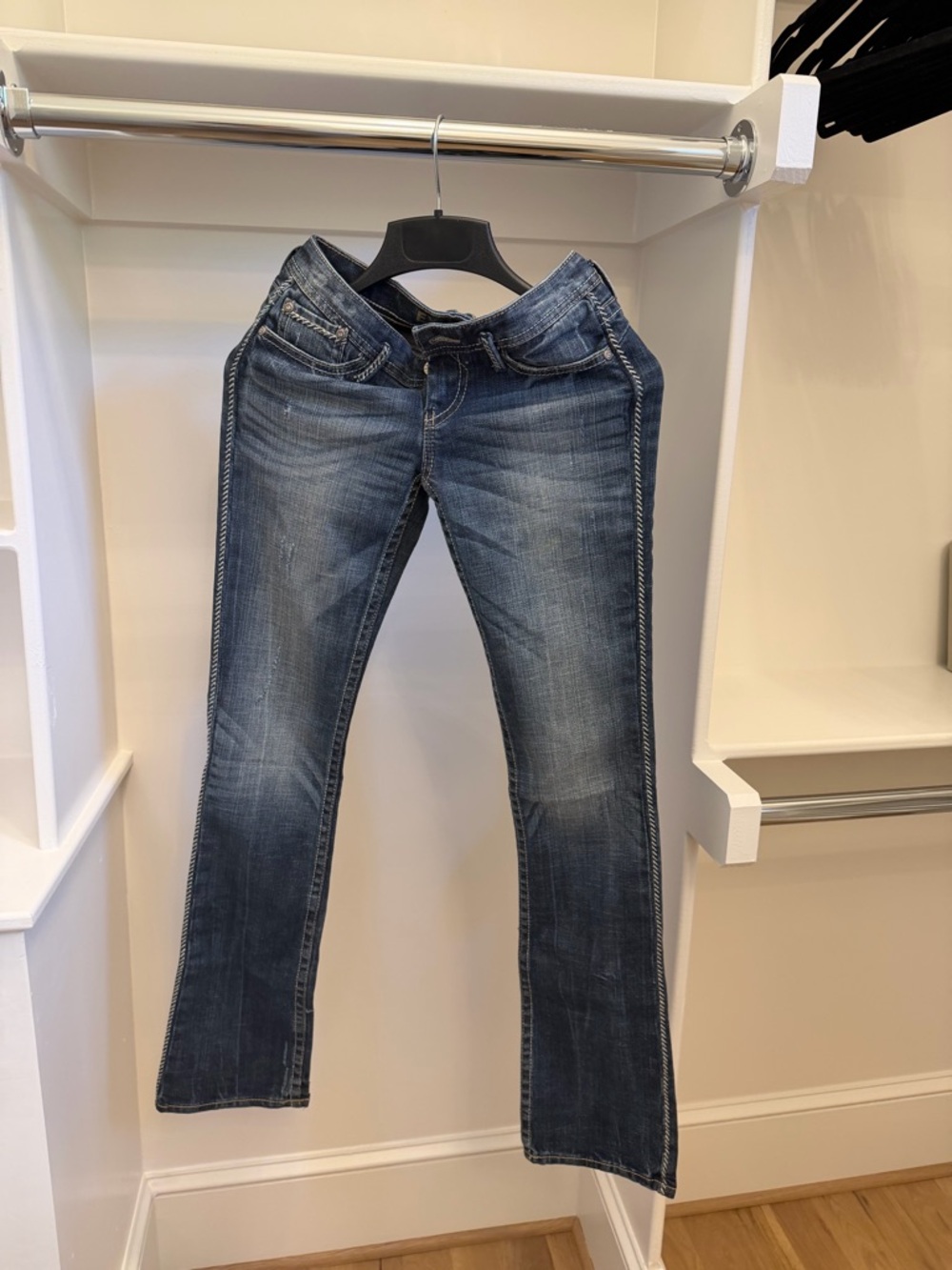 Express “Zelda Barely Boot” jeans in size 00